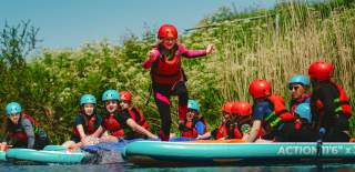 Group stand up paddle boarding - credit Mendip Activity Centre