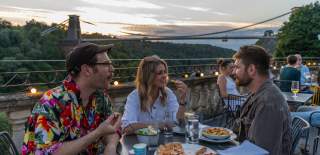 Group on terrace at White Lion in Clifton - credit Visit West
