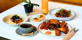 Selection of brunch dishes, coffee and juice at Colonnade in central Bristol - credit Colonnade
