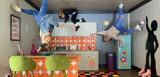 Family playing in kitchen - credit Upside Down House