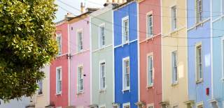 A row of multi-coloured houses in the Cliftonwood area of West Bristol - credit Paul Box