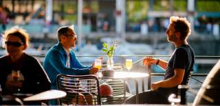 People on terrace at The Architect on Bristol Harbourside - credit Chris Cooper