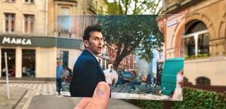 A view of Clare Street in Bristol's Old City, with a hand holding a photograph of actor David Tennant filming one of the 2023 Doctor Who specials in the same spot - credit Logan Walker