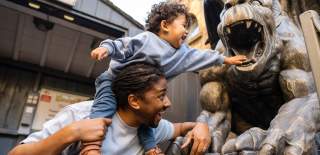 A father and son at Wookey Hole in Wells, near Bristol - credit Wookey Hole