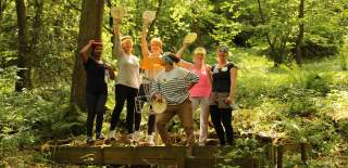 A group of women trying frisbee golf at Mendip Activity Centre near Bristol - credit Mendip Activity Centre