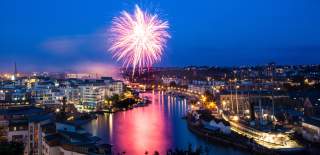 Fireworks over Bristol's Harbourside at night during the Bristol Harbour Festival - credit Chris Bahn