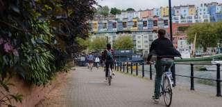 A group of cyclists riding along the Harbourside Loop path in central Bristol - credit Cycle the City