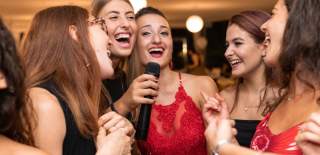 A group of women enjoying karaoke - credit GoHen