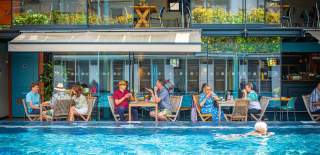 Bristol Lido people dining by pool