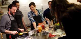 A group of men at a cooking class in Bristol - credit Cooking It!