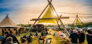 People enjoying sunset at Mendip Basecamp - JA