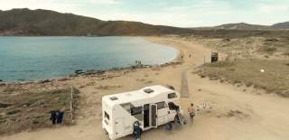 Campervan on beach - credit Motorhome Holiday Co