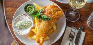 Plate of fish and chips with tartare sauce - credit Noah's Bristol