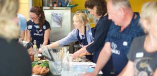 A group of people taking part in a cooking class at Papadeli in Clifton, West Bristol - credit Papadeli