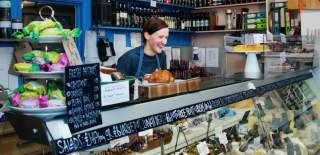 A server behind the counter at Papadeli in Clifton, West Bristol - credit Papadeli