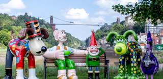Gromit Unleashed 3 statues in front of Clifton Suspension Bridge - credit Ambitious