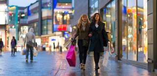 2 women shopping at night - Credit Destination Bristol