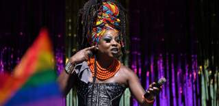 A performer on stage during the 'Son of a Tutu' show at Bristol Pride - credit Bhagesh Sachania Photography