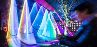 The 'Swing Song' installation in Queen Square during the Bristol Light Festival - credit Andre Pattenden