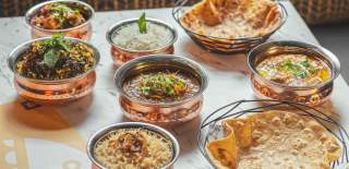 Selection of curries and breads of Bombil in Bedminster, Bristol - credit Bombil