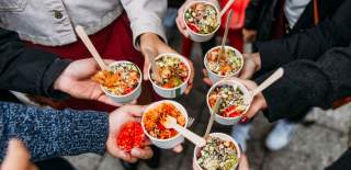 Group holding food samples - credit Food Tours of Bristol