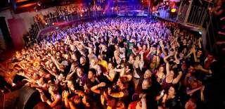 A group of people in a club - Credit Motion