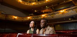Visitors watching a show at The Everyman Theatre in Cheltenham