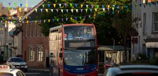 Double decker bus coming up Christchurch High Street