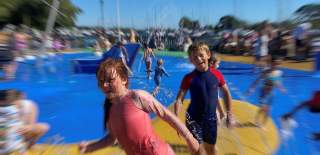 Children playing in water at Quomps Splash Park