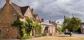 Houses on the green in Kingham