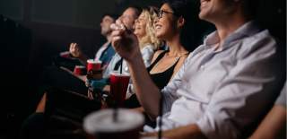 People sitting watching the cinema