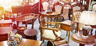 array of antique chairs, tables and lamps