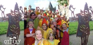 Pixie statues and children dressed as Ottery pixies