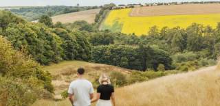 A couple walking through the Yorkshire Wolds