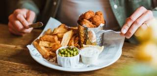 A close up of a plate of scampi and chips from the Ship Inn at Sewerby in Bridlington.
