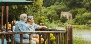 A couple enjoying the view at Folly Lake Cafe.