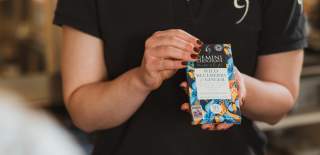 Someone holding a bar of chocolate from Gemini Chocolate in East Yorkshire.