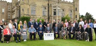 The Visit Hull and East Yorkshire Local Visitor Economy Partnership Board gathered together in front of Cave Castle Hotel