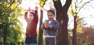 Two children on an Easter egg hunt
