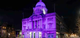 Hull city hall lit up purple