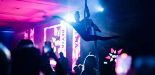 An aerialist performing at the 2023 REYTAs