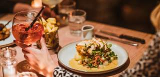 Enjoying a delicious meal and a glass of wine at the Triton Inn in East Yorkshire