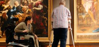 Ferens Art Gallery includes 2 people one in motorised wheelchair and 1 using crutches