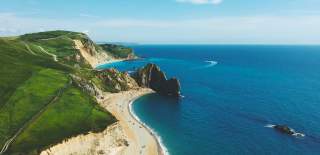 A view of the coast and sandy beaches in Exonbury.