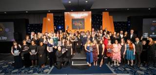 A large group shot of the winners at the West Midlands Tourism Awards 2025