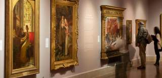 Visitor looking at a piece of Art at City Art Gallery