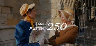 Two women dressed in period pieces in celebration of Jane Austen 250