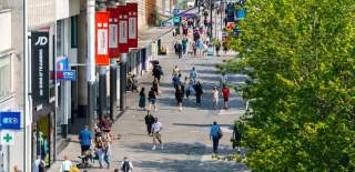 Top down view of people walking around Above Bar Precinct in the summer