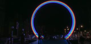 Image shows ARC installation from Lightport - a 10ft rainbow archway on Lord Street