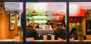 The inside view of a cafe from the outside window